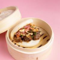 (2) Braised Beef Bao · Two Steamed gua bao: Ginger bao bun with braised beef, garlic sauce, kimchi, pickled onions,...