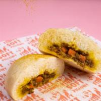 (2) Japanese Beef Curry Bao · Two steamed bun filled with ground beef, caramelized onions, carrots, and mild spices in a c...