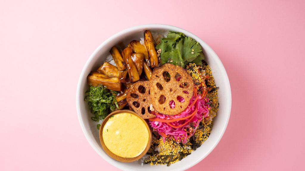 Glazed Eggplant Rice Bowl · Homemade hoisin glazed eggplant served with carrot-mint sauce, wasabi lotus root chip, herbs, sesame and furikake over steamed rice.