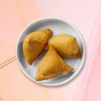 Thai Sayonara Samosa · Crispy puff pastry filled with potatoes, onions, and curry powder served with cucumber salad.