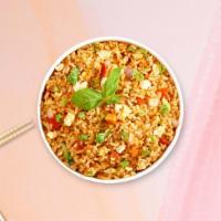 Upper West Fried Rice · Fried rice with green peas, carrots, and onions.