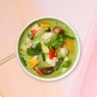 Green Curry Hackman · Green curry with eggplant, green peas, bell peppers, and basil cooked in coconut milk.