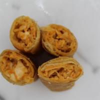 Buffalo Chicken Eggroll · A salty, mild, tangy buffalo wing inside a crispy eggroll! Comes with ground chicken, mozzar...