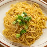 Garlic Noodles · Our garlicy noodles tossed in our bulgogi sauce, and parmesan cheese!
