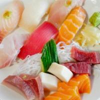 Sushi & Sashimi Combo · raw. Six pieces nigiri and eight pieces assorted sashimi.