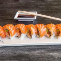 2. Summer Roll · Raw. Crab, avocado, spicy tuna, and green onion; topped with salmon.

Consuming raw or under...