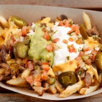 Sisig Fries · French fries topped with nacho cheese, sour cream, guacamole, pico de gallo and pickled jala...
