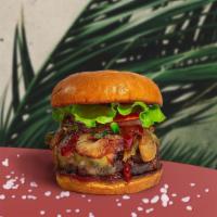 Vegan BBQ Sizzle Burger · Seasoned vegan burger patty topped with vegan cheese, barbecue sauce, lettuce, tomato, onion...