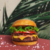 Baby She's So Classic Vegan Burger · Seasoned vegan burger patty topped with lettuce, tomato, onion, and pickles. served with a s...
