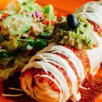 Chile Relleno Burrito · Flour tortilla stuffed with a Chile relleno, rice, beans, cheese and salsa mexicana. Topped ...