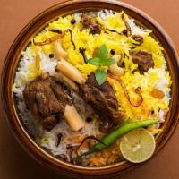  Mutton  Biryani · Mutton Dum Biryani   is packed with flavors of the caramelized onions and the spices.