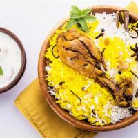 Chicken  Biryani · Hyderabadi chicken biryani is an aromatic, mouth watering and authentic Indian dish with per...