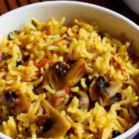 Mushroom Biryani · Mushroom biryani is a delicious one pot dish made with rice, mushrooms, masala powder & herbs.