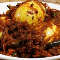 Egg Pepper Roast · Egg roast is a dish native to Kerala, India, consisting of eggs roasted in a masala gravy.