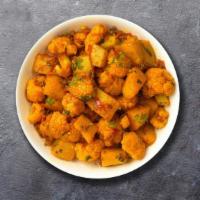 Call Me Cauliflower & Potatoes · Fresh cauliflower and potatoes slow cooked in a curry sauce with herbs and spices.