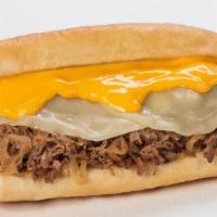 Cheesesteak · Thinly sliced steak with melted provolone, cheddar cheese sauce & griddled onions on a toast...