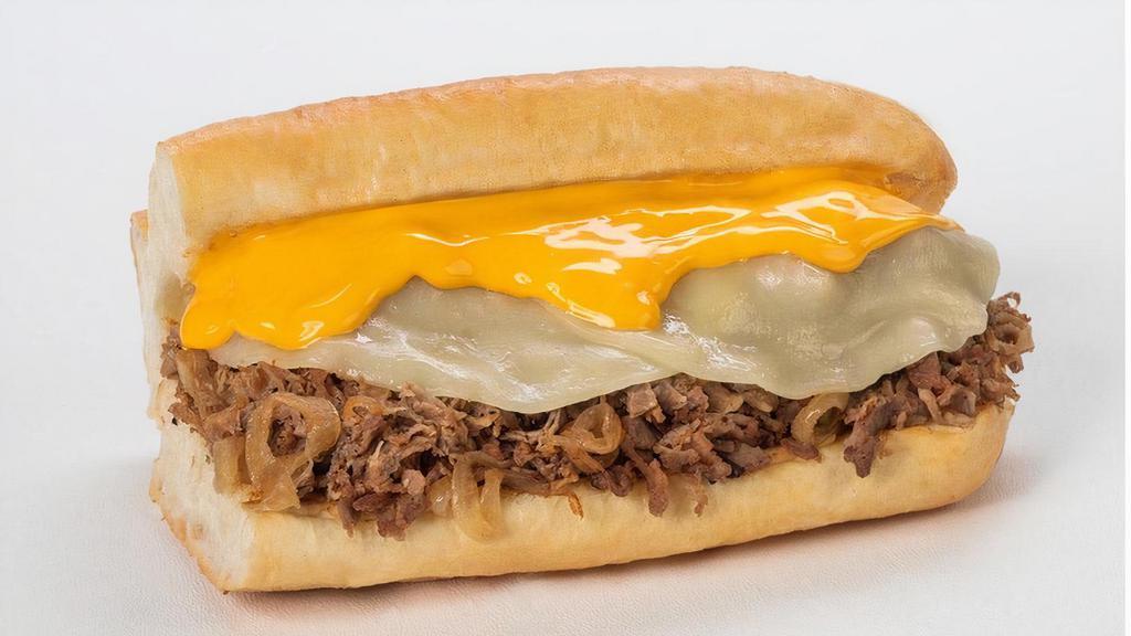 Cheesesteak · Thinly sliced steak with melted provolone, cheddar cheese sauce & griddled onions on a toasted hoagie roll