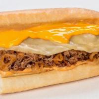 Chipotle Cheesesteak · Thinly sliced steak with melted provolone, cheddar cheese sauce & griddled onions, doused wi...