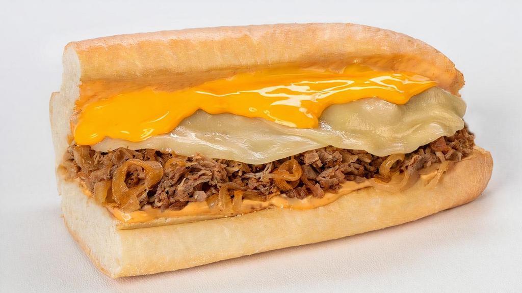 Chipotle Cheesesteak · Thinly sliced steak with melted provolone, cheddar cheese sauce & griddled onions, doused with chipotle sauce on a toasted hoagie roll