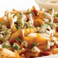 Super Duper Loaded Fries · Fries topped with melty cheese, bacon, tomatoes, onions, and jalapenos.  We called it “Super...
