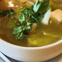 Tom Kha · Coconut milk based soup with lemongrass, kaffir lime leaves, mushroom and cilantro.
