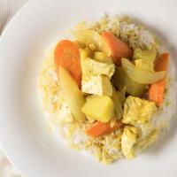 Yellow Curry · Yellow curry with potato, onion and carrot served with rice.