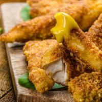 Honey Mustard Chicken Strips · Pieces of chicken breast cut into strips, breaded, seasoned and fried to perfection. Tossed ...