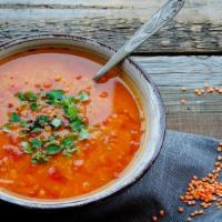 Classic Lentil Soup · Mediterranean famous lentil soup mixed with carrots, potatoes, zucchini and spices. Served w...