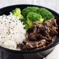 Bowls - Kalbi Beef · Kalbi beef on rice, noodle, or organic spring mix.  Sauce included.