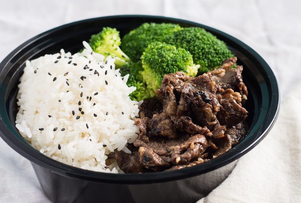 Bowls - Kalbi Beef · Kalbi beef on rice, noodle, or organic spring mix.  Sauce included.