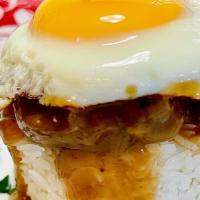 Loco Moco · Hawaiian soul food.  Ground beef patty on white rice, smothered in brown gravy, topped off w...