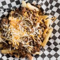 Loaded Fries · BBQ beef over fries drizzled with spicy mayo and topped with shredded cheese.
