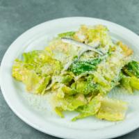 Caesar Salad · Crunch romaine lettuce topped with parmesan cheese, crispy croutons, and Caesar dressing.