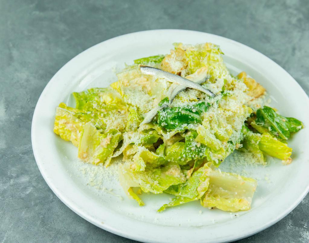 Caesar Salad · Crunch romaine lettuce topped with parmesan cheese, crispy croutons, and Caesar dressing.