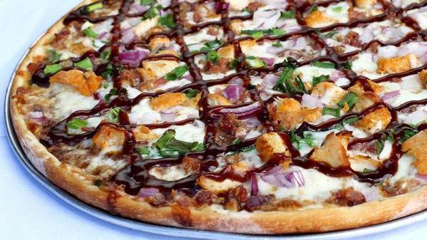 BBQ Chicken · BBQ sauce, roasted marinated chicken, bacon, green onions, red onions.