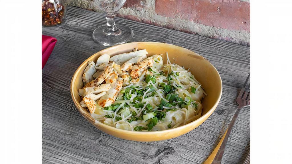 Chicken Run Pasta · Fettuccine alfredo Sauce with: grilled chicken, topped with parmesan cheese, green onions and parsley