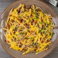 Wild Fries · Fries with melted cheese, bacon and garlic
garnished with shredded mozzarella and parsley