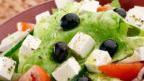 Large Greek Salad · Romaine hearts, red onions, kalamata olives, tomatoes, cucumbers, and feta cheese.