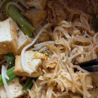 81. Pad Thai with Tofu · Rice noodles pan-fried with tofu, chili powder, egg, green onions, bean sprouts, and peanuts...