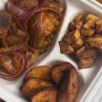 Grandmas Asun with Sweet potatoes and plantains · Smoked Goat meat stir fried in a spicy/sweet red pepper and onion sauce, served with fried p...