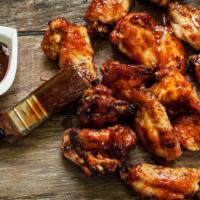 BBQ Wings · Our signature, golden, crispy fried wings with sweet & smoky BBQ sauce.