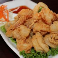 Koo Ruk (Fried Shrimp and Calamari) · Deep fried shrimp and calamari serve with sweet chili sauce
