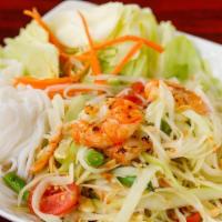Som Tum Vegetarian Salad · Shredded green papaya salad with green beans, tomatoes, and ground peanuts in a chili-lime d...