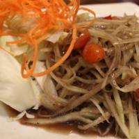 Som Tum Lao Salad · Papaya salad lao style. Shredded green papaya salad with fremented crab paste, tomatoes and ...