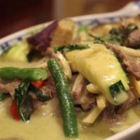 Gang Khew-Wan Curry (Green Curry) · Green curry. Green curry with bamboo shoots, eggplants, red bell peppers, green beans, and f...