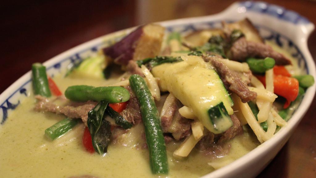 Gang Khew-Wan Curry (Green Curry) · Green curry. Green curry with bamboo shoots, eggplants, red bell peppers, green beans, and fresh basil. Tofu and vegetable.