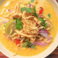 Chaing Mai Noodles Soup · Kao soy thai. Egg noodles served in yellow curry soup with chicken, pickled mustard greens a...