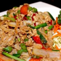 Chai Thai Noodles · Stir fried rice noodle with ground chicken, onions, diced green beans and red bell peppers.