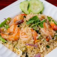 Basil Fried Rice · Thai style fried rice with eggs, basil, red onions, and green onions