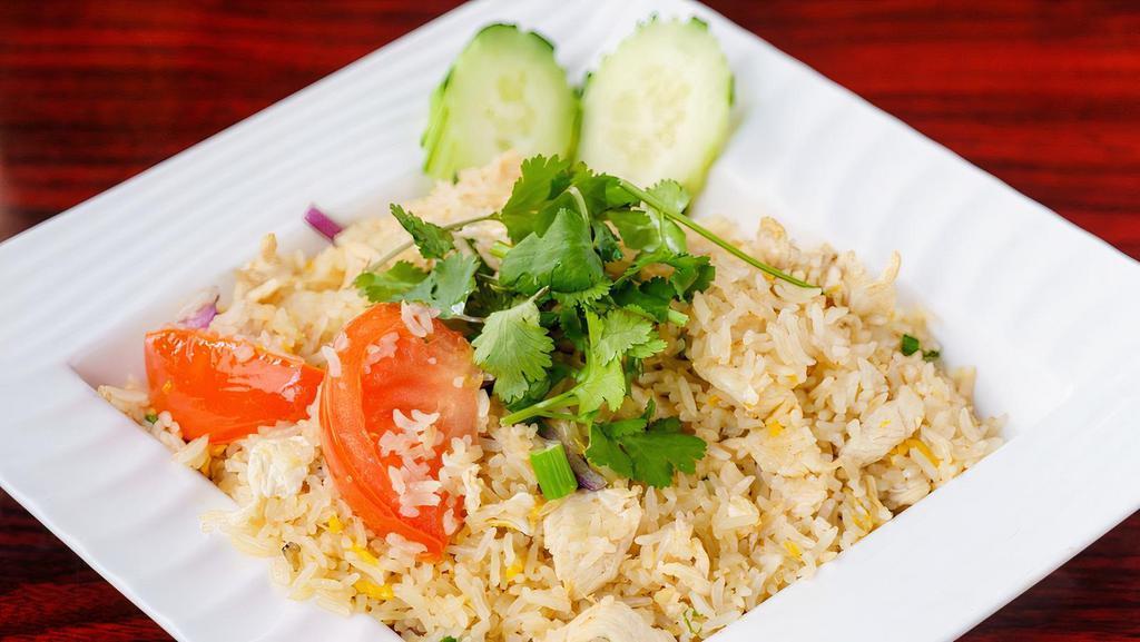 Kao Pad Fried Rice · Tofu and vegetables. Thai style fried rice with tomatoes, eggs and onions.